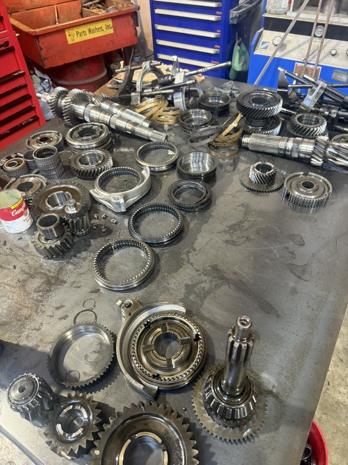 Transmission parts laid out on workbench