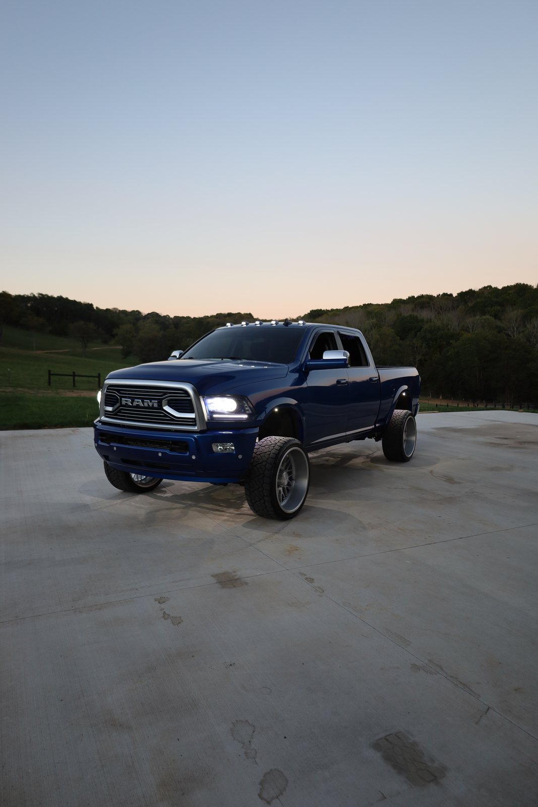 Blue Ram front view parked at sunset